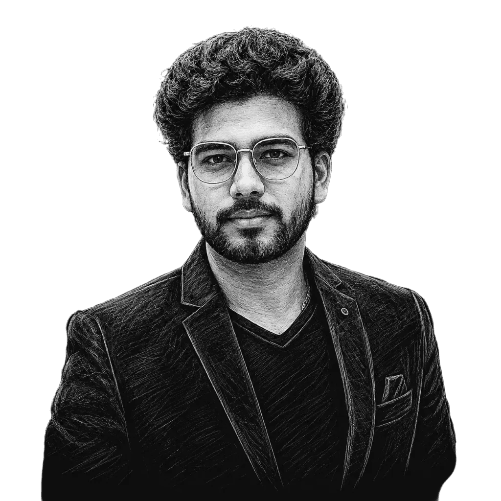 Haneef Shaik, wearing glasses and a navy jacket.